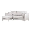 **Sofa narożny z szarym pokryciem i poduszkami**
